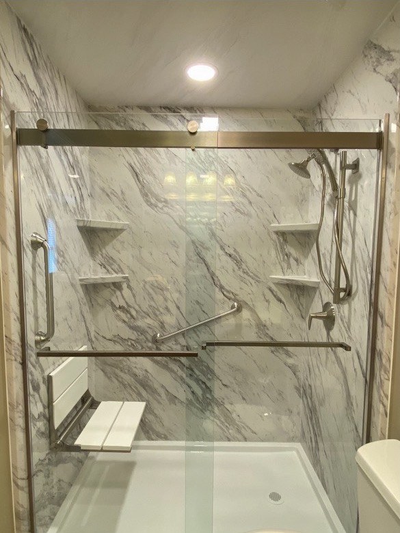 A finished Carolina Bath Solutions walk-in shower, converted from a tub